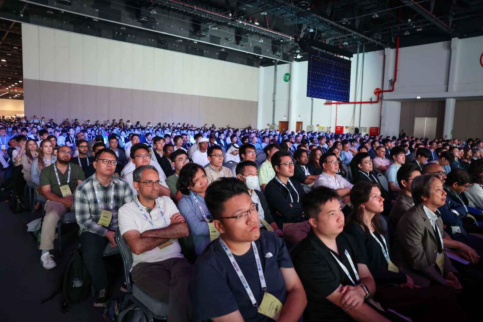Participants listening to a presentation at IROS 2024 in Abu Dhabi