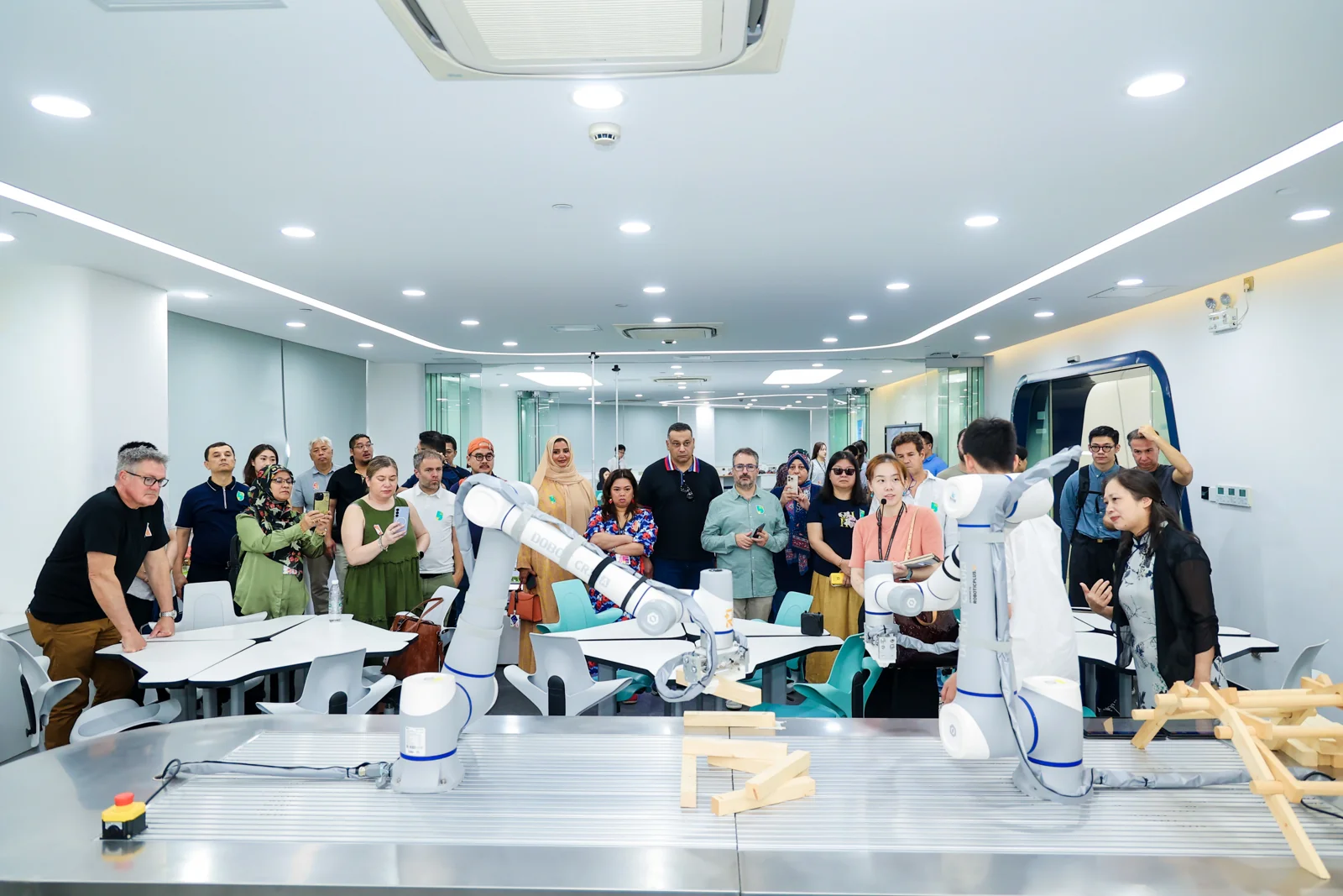 International delegates visiting a robotics application site during Tomorrow.City Shanghai 2025