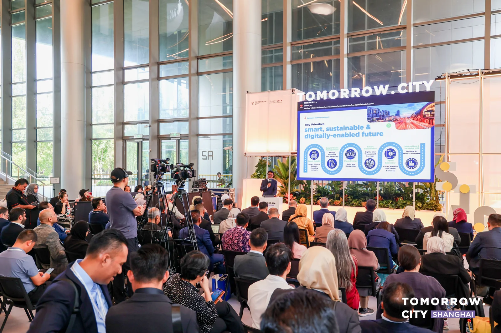 Participants listening to urban and technology solution presentations at the Tomorrow.City Shanghai 2025 open forum